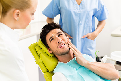 dentist examining a patient's teeth