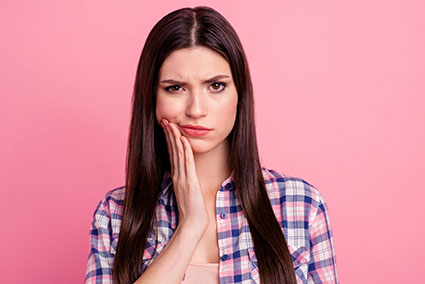 a woman with sensitive teeth