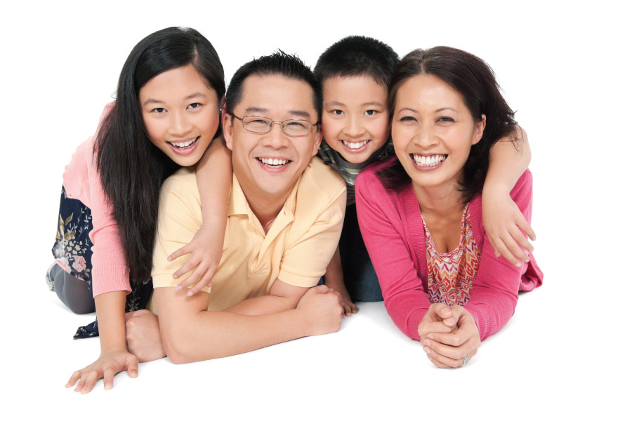 Asian couple with two young daughters.