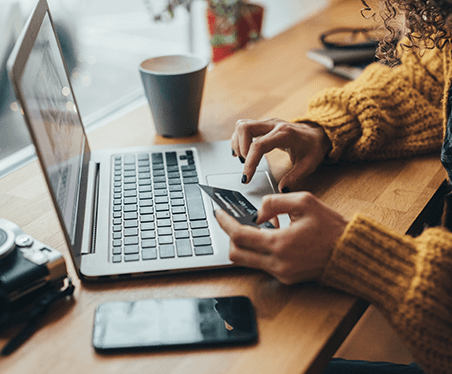 someone paying a bill on the computer