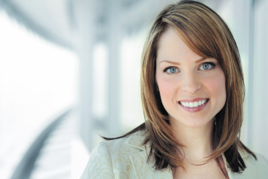 Smiling business woman with beautiful teeth.